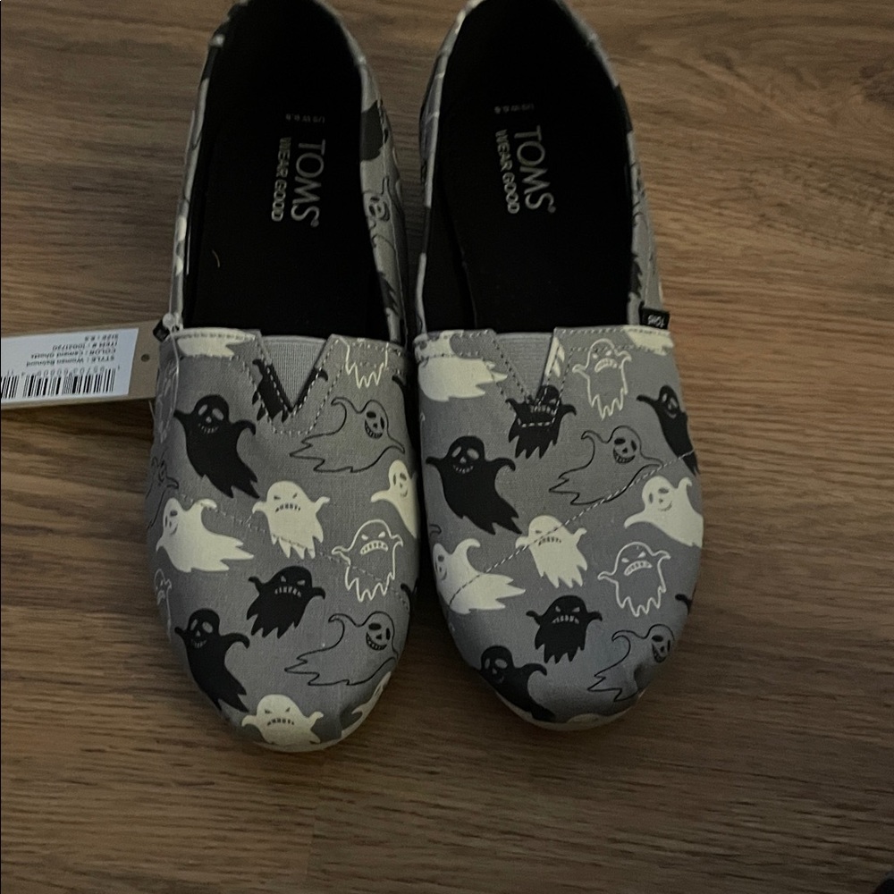 TOMS Ghost Patterned Slip-Ons in Black and Gray